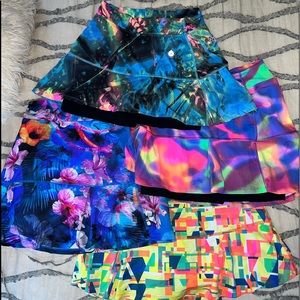 4 Donajo Brand multicolor tennis skirts.